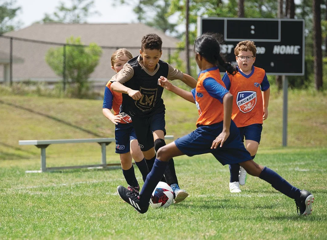 Kids playing MLS GO soccer