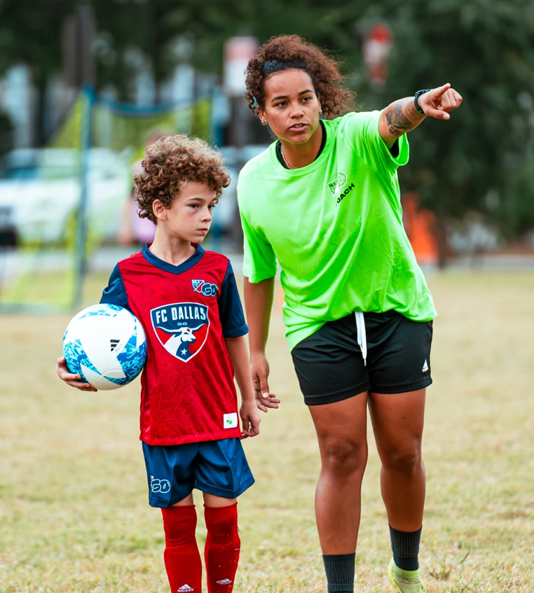 MLS GO coach working with young players in Suffolk County